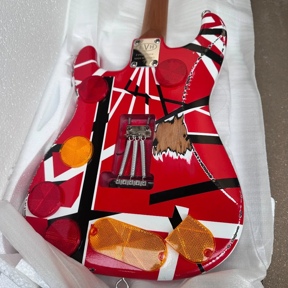 US Shipping  ST Electric Guitar Red/Black/White Striped Finish, Maple Fingerboard, SH Pickup Configuration, Vintage Tremolo System For Rock Players Free Shipping